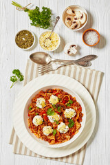 Lasagnette with ground beef in bowl, top view