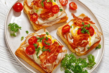 Kentucky Hot Brown open sandwiches on a plate