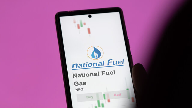 November 21st 2023. The trading page of National Fuel Gas on a stock exchange, a shareholder analyzing $NFG on a device.
