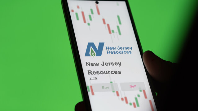 November 21st 2023. The trading page of New Jersey Resources on a stock exchange, a shareholder analyzing $NJR on a device.