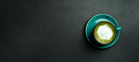 cup of delicious matcha latte on light gray background, closeup. Top view.