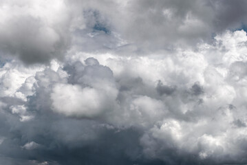 Dense cumulonimbus heralds showers over the city