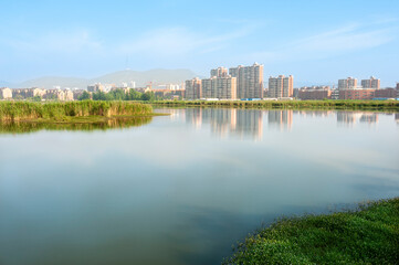 Fototapeta na wymiar City scenery, lakes and urban architecture in Anhui, China.