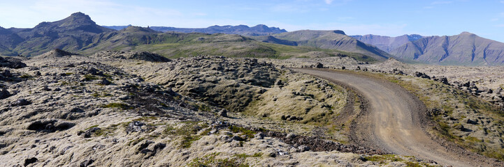 A view of the dirt road among the lava fields. Helgafellssveit, Iceland.