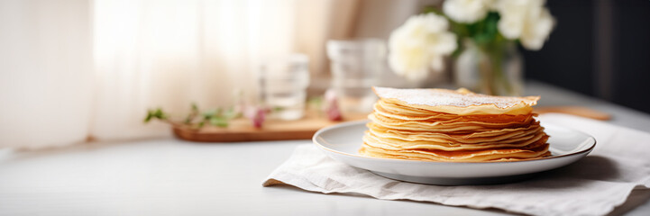 Stack of crepes (french pancakes) on a plate, Chandeleur celebration web banner with copy space - obrazy, fototapety, plakaty