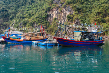 Squid boats with powerful bulbs at the Cua Van floating village, Halong Bay, Vietnam