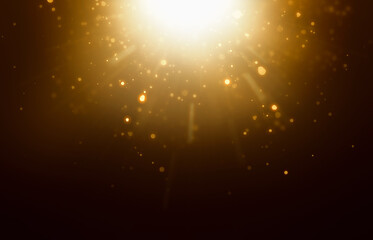 gold dust and particles falling from a flash of light