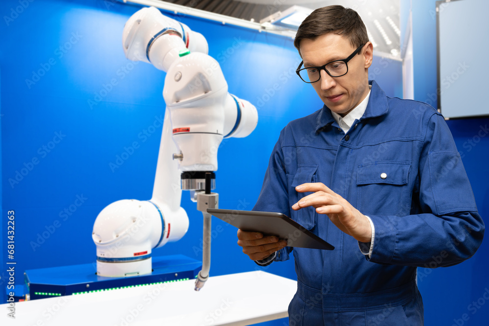 Aufkleber Automatic welding robot in a modern factory in operation