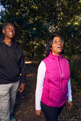 Fototapeta premium Adult Senior Black Couple Walking on Hiking Trail in Nature 