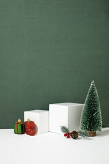 Set of christmas realistic cylinder podium. green texture background. Mockup product display. Stage...