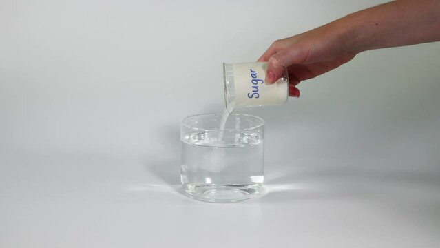 - Observing the process of sugar dissolving in water