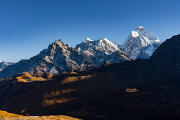 Early morning sunrise in the hImalayas of Nepal with Mt. Kumbhakarna (Jannu HImal) and mountains