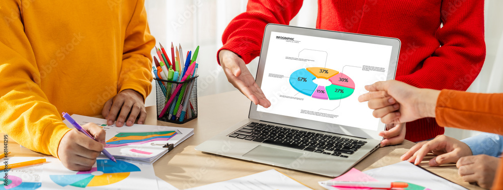 Poster startup company employee working together using laptop analyzing bi dashboard paper on financial dat