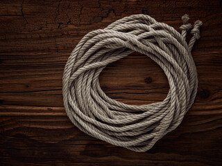 Dark vintage marine background with old hemp rope