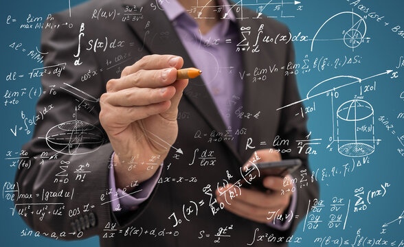 Mathematical expressions with business hand pointing a finger at a formula. Solution to the problem concept