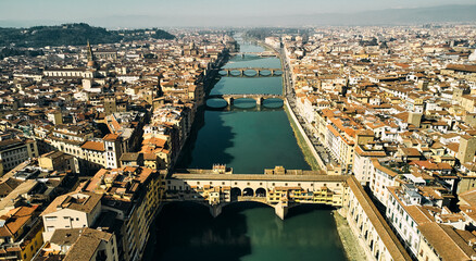 Aerial view of Ponte Vecchio bridge and Arno river in Florence. High quality photo