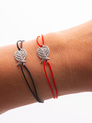 two pair bracelets are made of Korean rope and there is a love emblem that can be fused because there are magnets in it.