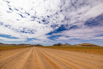 Wide gravel road in the desert