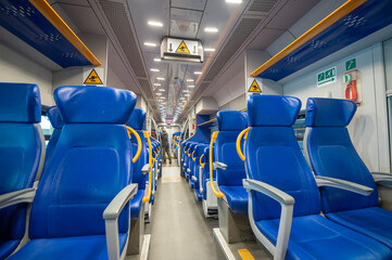 Panorama of passengers inside the Leonardo Express train from Fiumicino Airport to Roma Termini in Rome in 2023 in Italy.