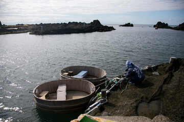 Obraz premium A tarai-bune, or tub-turned boat, is a traditional Japanese fishing boat found mainly on Sado Island in Niigata prefecture, Japan.
