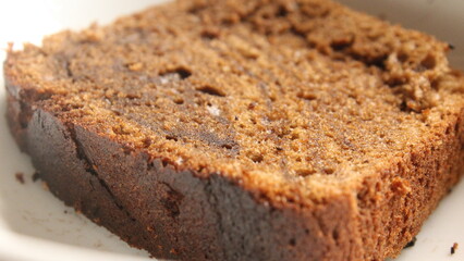 Fototapeta na wymiar cropped image of slice of bread on a bowl