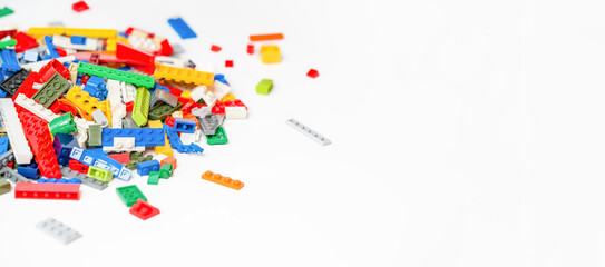 Colorful Building Blocks Banner: Creative Construction on White Background. Copy space