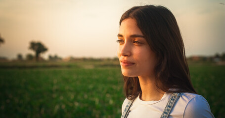 Close Up Portrait of a Beautiful Young Female Looking into the Distance. Smiling Girl with Natural...