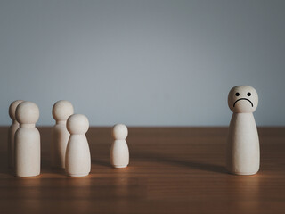 The wooden puppet is frowning or angry. lonely place