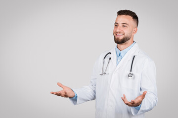 Male doctor gesturing with open hands