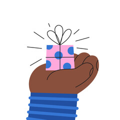 A small gift box on a hand. Adorable greeting card. - 681483862