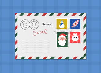 White envelop with a Christmas cute postage stamps.