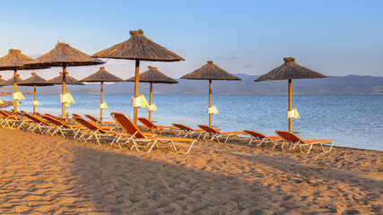 Thatched parasols on beach