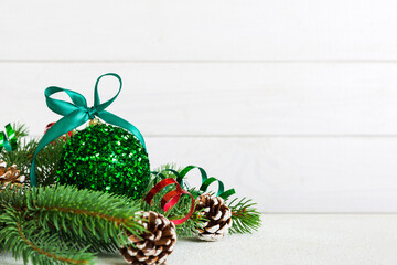 New Year Christmas tree toy, branches of a christmas tree, New Year decorations on a colored background