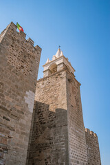 Obraz premium Perspective of medieval walls of Mourao castle with keep tower in gothic style, PORTUGAL