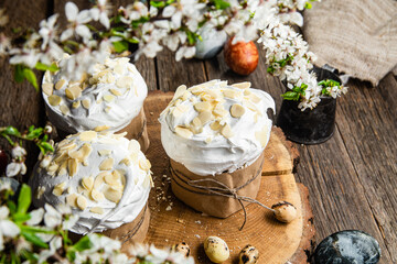 Fototapeta na wymiar panettone. Easter cake with meringue and decoration on the table