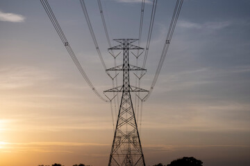 High-voltage Power lines at sunset 