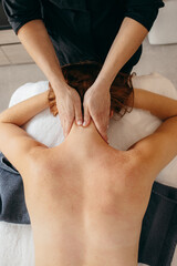 Female hands doing neck massage