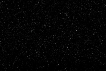 Realistic snowflakes on clean black illustration background.