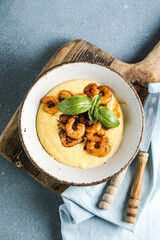 A traditional Italian dish is polenta. Venetian shrimps with polenta