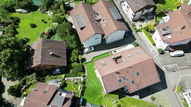 Swiss village on the shore of a mountain lake. top view.