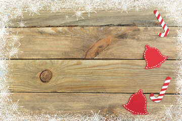 Christmas composition on wooden background with blank space for ads. Top view.