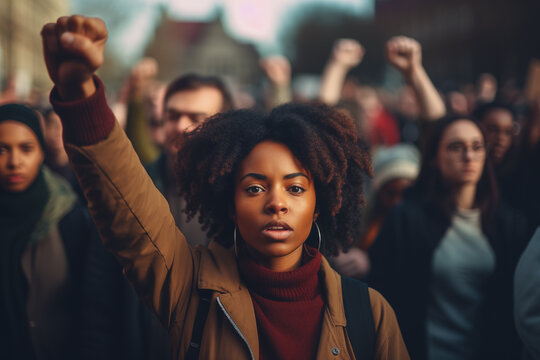 Photo of a black female on the street during protest