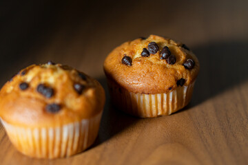 mini cupcakes on a wooden plate