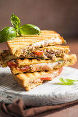 Delicious sandwiches with tuna, tomato and cheese. Homemade Tomato BLT Sandwich with tuna