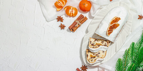 Traditional Christmas stollen, German cake. European pastry, fragrant home baked bread with spices