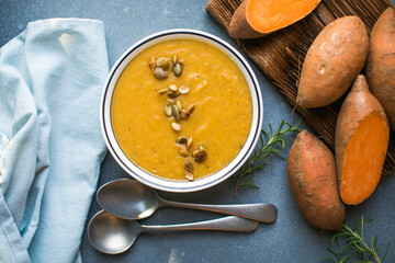 Sweet Potato Soup, Tasty Homemade Pumpkin, Sweet Potato, Carrot Soup in a Bowl on Bright Background