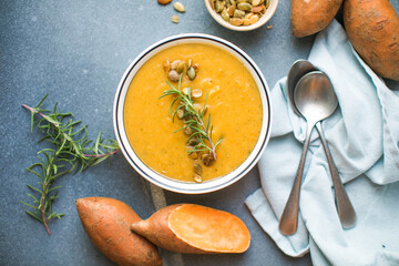 Sweet Potato Soup, Tasty Homemade Pumpkin, Sweet Potato, Carrot Soup in a Bowl on Bright Background