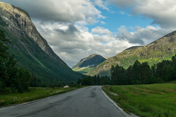 View of mountains landscape, country road in foreground