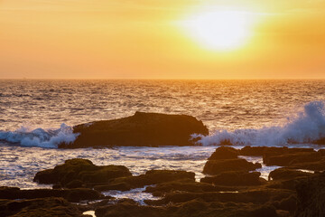Sunset on the Atlantic Ocean in the area of Essaouira in Morocco on a summer evening.