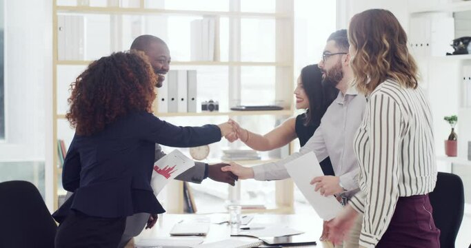Group, teamwork or business people shaking hands in meeting for negotiation or b2b agreement. Hiring, handshake or happy employers with success, target or partnership deal opportunity for employees